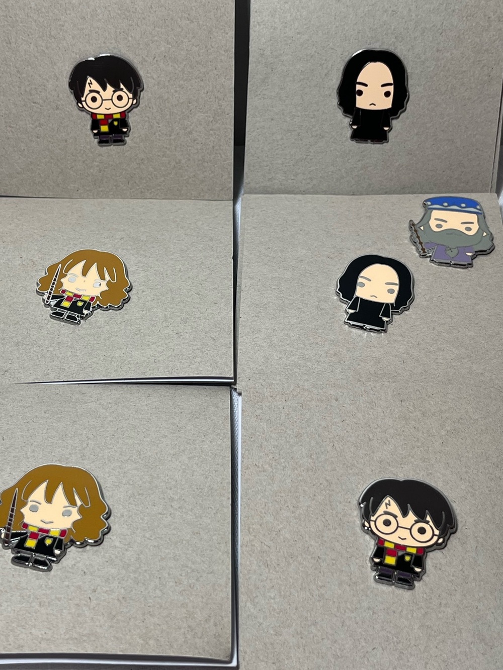 Harry Potter Enamel Character Pins
Set of 7
Like new